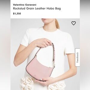 Valentino Garavani
Rockstud Grain Leather Hobo Bag in Pink. Brand new